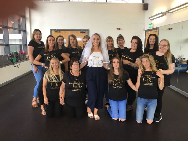 Britney Spears hen do dance class Leeds - hen party group enjoying Princess of Pop routine with instructor