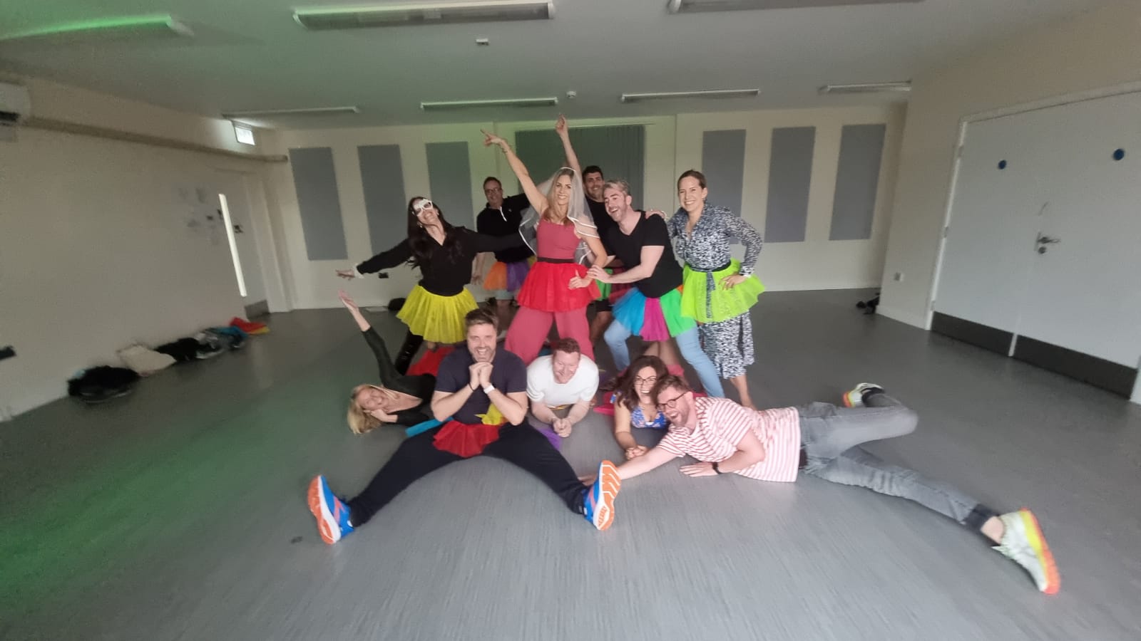 Samba themed hen do dance class Leeds - hen party group enjoying Latin dance routine with professional instructor