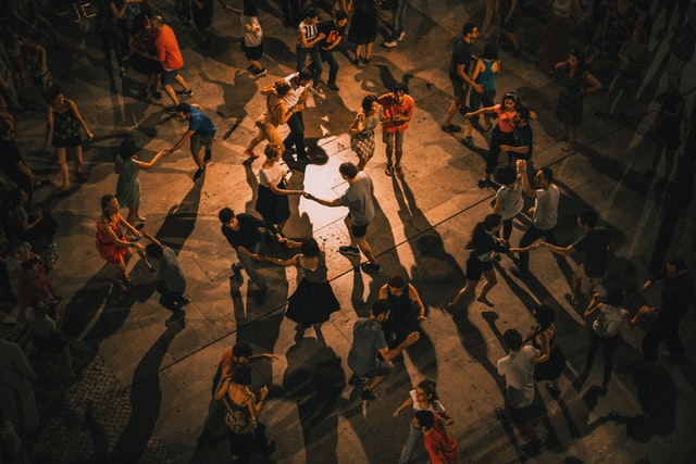 Salsa hen party dance class Leeds - group of women learning sensual Latin partner moves in city centre studio
